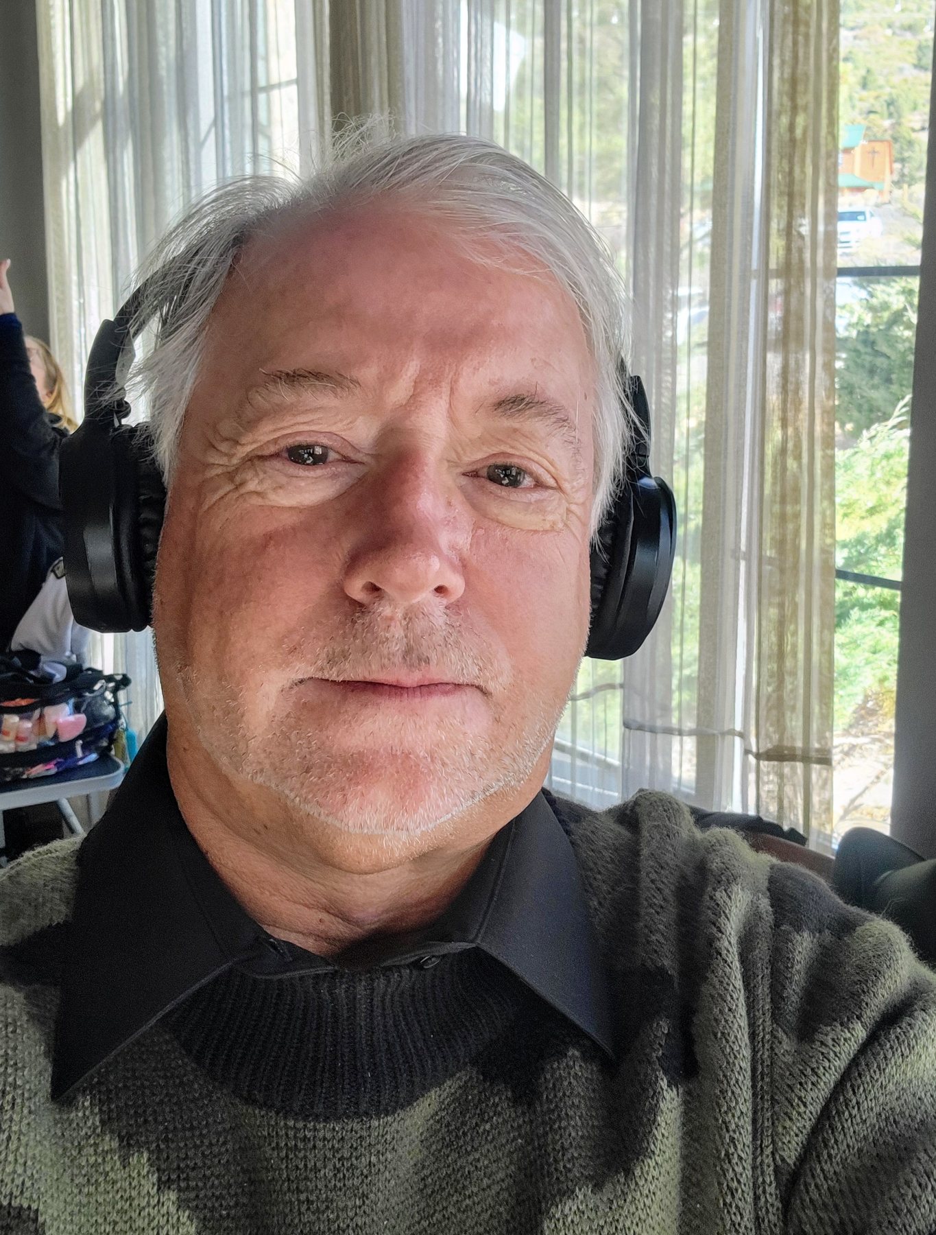Peter Murphy III wearing headphones during production